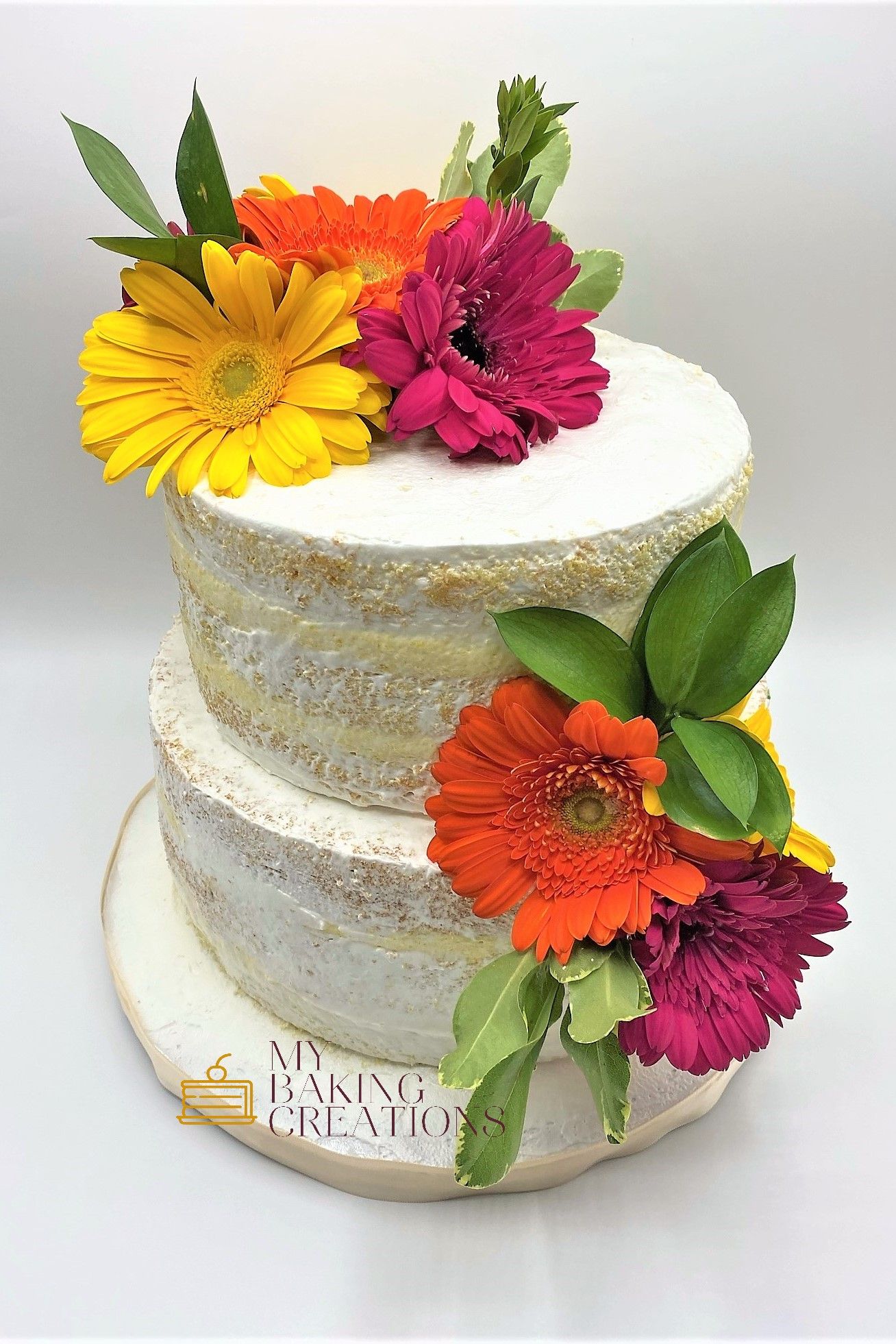 Rustic naked wedding cake with natural decorations San Francisco